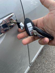 Nissan key fob emergency key used to unlock the doors in case the battery dies