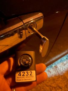 Cadillac key fob and emergency key in door cylinder