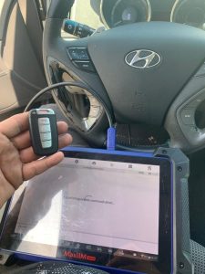 Automotive locksmith programming a Hyundai key on-site