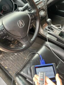 Acura RDX key fob coding by an automotive locksmith