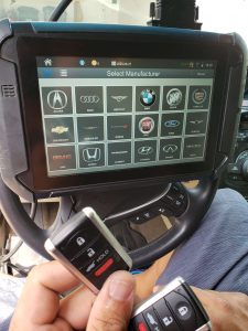 Automotive locksmith coding an Acura ZDX key fob