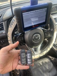 Mazda CX-7 key fob coding by an automotive locksmith
