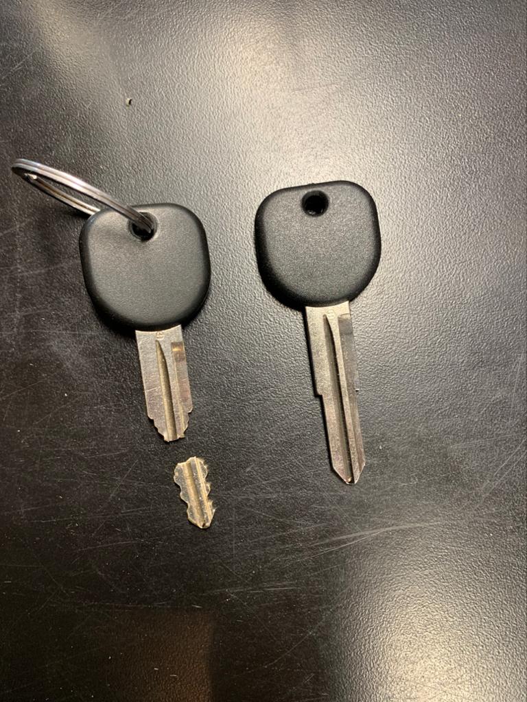 Broken car key and new one