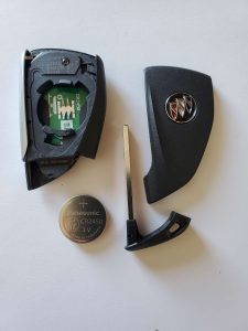 The key fob on the inside - Battery, chip and emergency key
