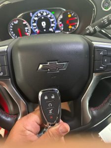 Automotive locksmith coding a Chevrolet Blazer key fob