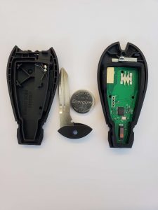 The key fob on the inside - battery , chip and emergency key (Fobik)