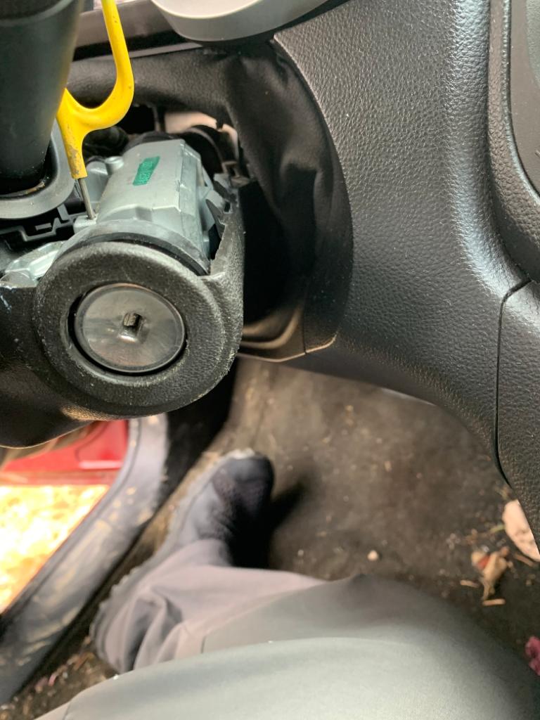 Automotive locksmith replacing an old ignition