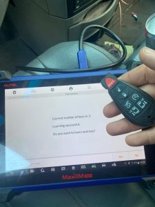 Chrysler Town & Country key fob coding by an automotive locksmith
