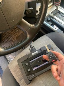 Automotive locksmith coding a Dodge Nitro transponder key