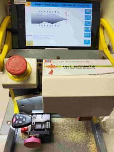 Dodge transponder key on cutting machine and cuts by code