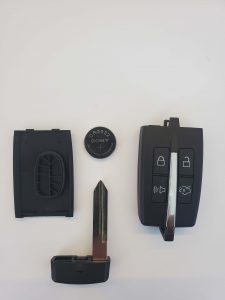 An inside look of Ford key fob - battery, chip and emergency key