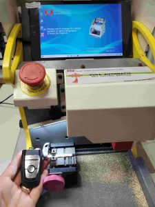 Ford key fob on a computer operated cutting machine