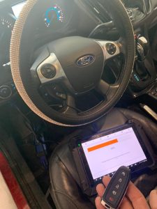 Automotive locksmith coding a Ford Flex key fob
