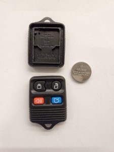 Parts of Ford keyless entry remote and battery