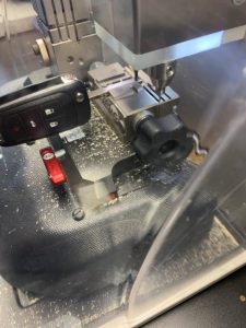 Cutting machine used by an automotive locksmith for Buick key