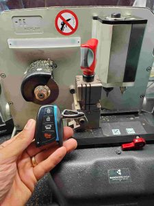 Cutting machine used by an automotive locksmith for Hyundai keys