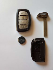 An inside look of Hyundai key fob and battery