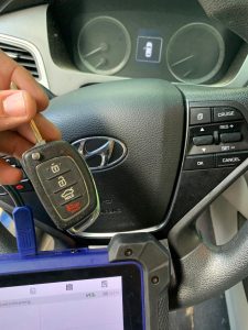 Both automotive locksmith and the dealer will have to code the key for you 