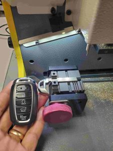 New Hyundai key fob on a computer operated cutting machine