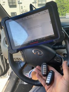 Infiniti G37 key fob coding by an automotive locksmith