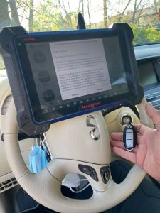 Infiniti QX70 key fob coding by an automotive locksmith