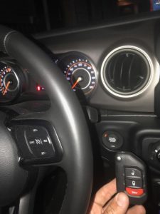 Push the "start" button with your dead key fob to start the car like in this picture