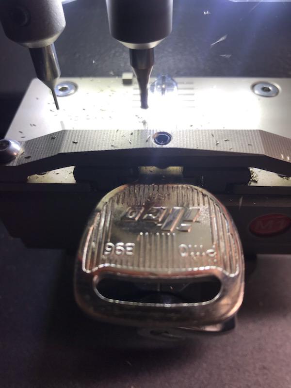 Broken key pieces on cutting machine