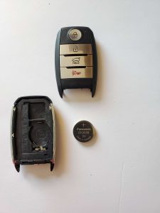 The key fob on the inside and battery