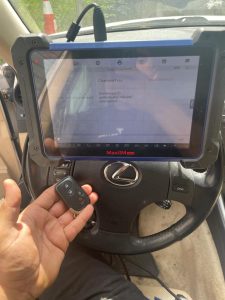 Automotive locksmith coding a Lexus GS430 key fob