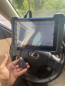 Automotive locksmith coding a Lexus LS460 key fob