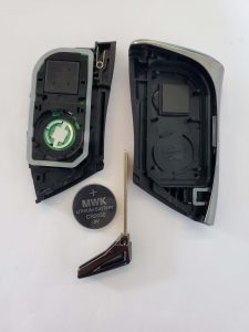 An inside look of Lexus key fob and chip