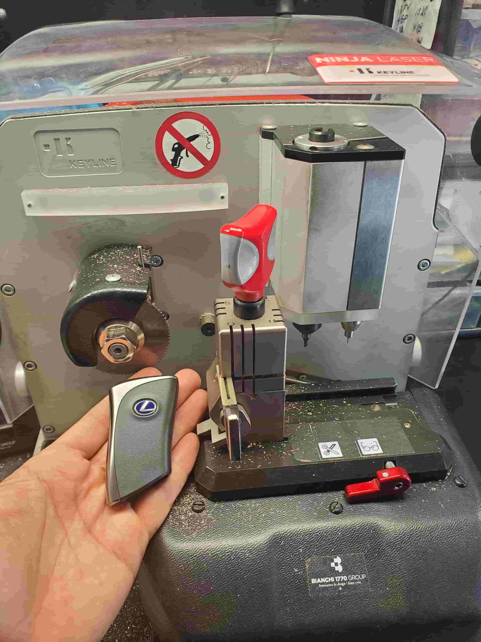 Lexus key fobs and emergency key on cutting machine (11)