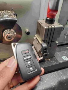 Lexus key fob on a cutting machine