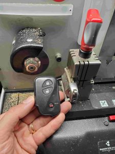 Cutting machine for Lexus key fob used by an automotive locksmith