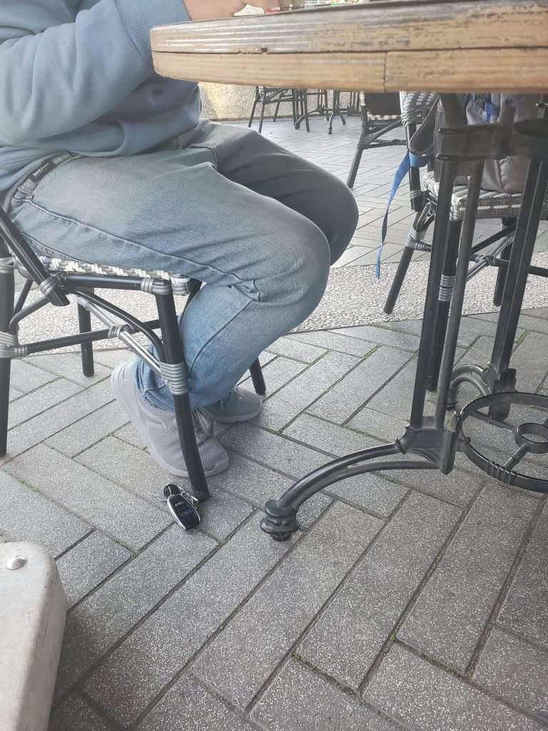 Lost car keys under a table