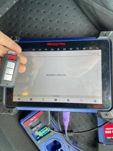 Mitsubishi Eclipse key fob coding by an automotive locksmith