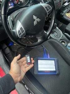 Mitsubishi key fob coding by an automotive locksmith