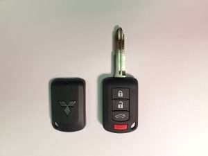 2016, 2017 Mitsubishi Lancer transponder car key replacement (OUCJ166N)