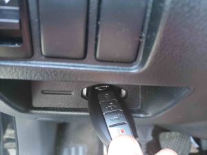 To start a Nissan with a dead key fob, insert it to the designated slot