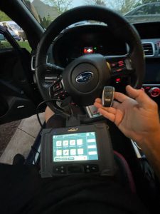 Automotive locksmith coding a Subaru Ascent key fob