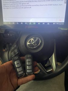 Automotive locksmith coding a Toyota Yaris key fobs