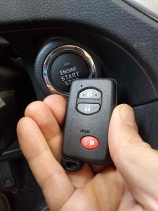 Push the "start" button with your dead key fob to start the car like in this picture