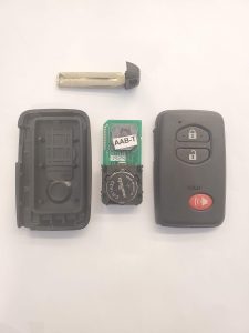 The key fob on the inside - battery, chip  and emergency key
