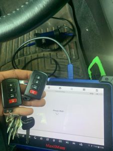 All Toyota key fobs and transponder keys must be programmed on site with a special machine like in this picture
