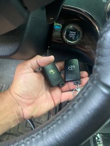 Push the "start" button with your Toyota key fob to start the vehicle in case the battery died