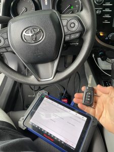 Automotive locksmith coding a Toyota RAV4 key