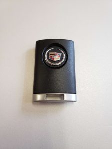 Original OEM Cadillac key fob (ouc6000066)